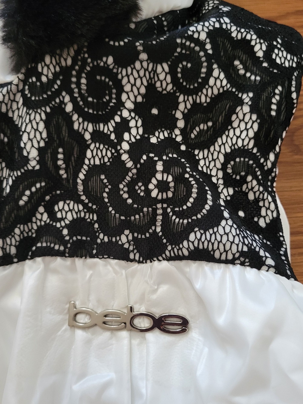 bebe Bonded Lace Puffer Hooded Vest with Black Lace and Faux Fur Trim - Picture 3 of 5